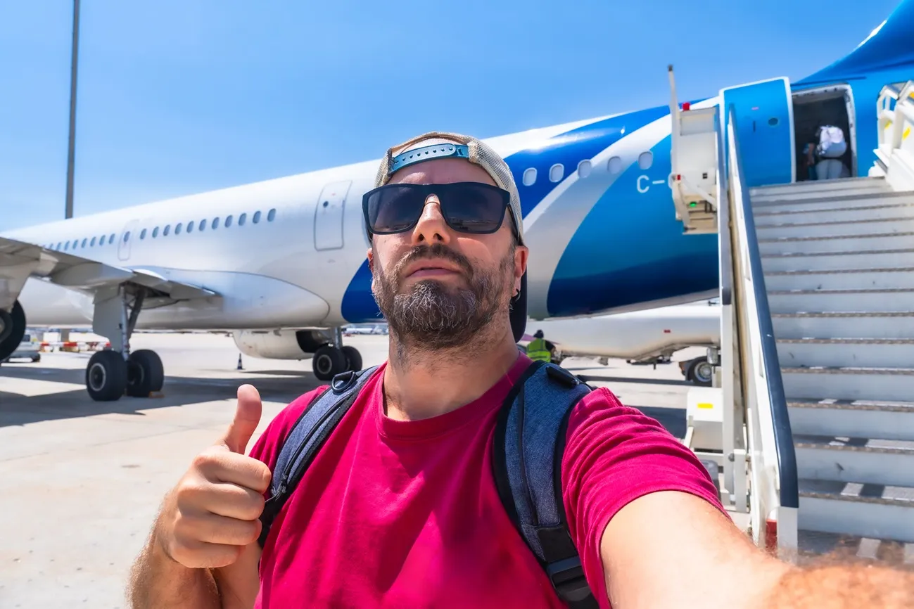 tourist near aircraft